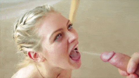 Blonde babe gets spunk shower